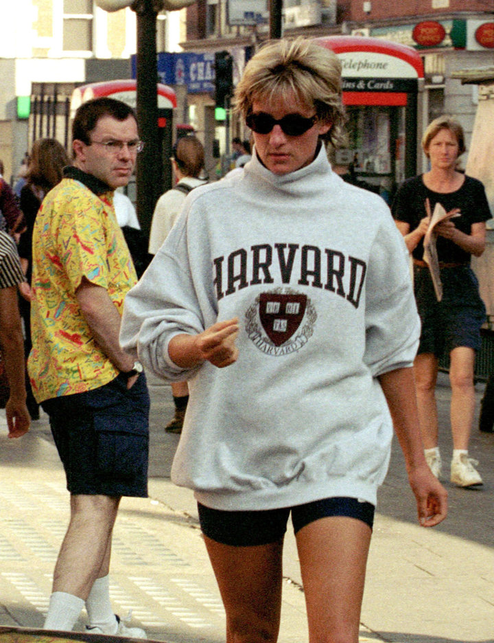 Wearing a Harvard sweatshirt while out and about in London.&nbsp;
