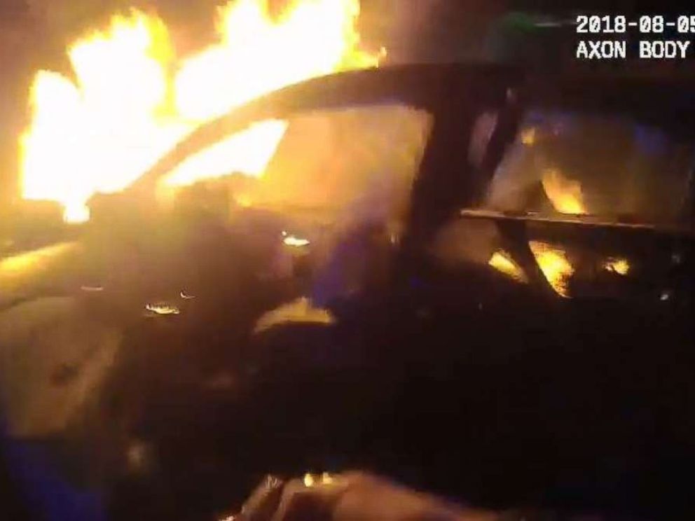 Atlanta police officers pulled a passenger out of a burning vehicle on Sunday, Aug. 5, 2018.